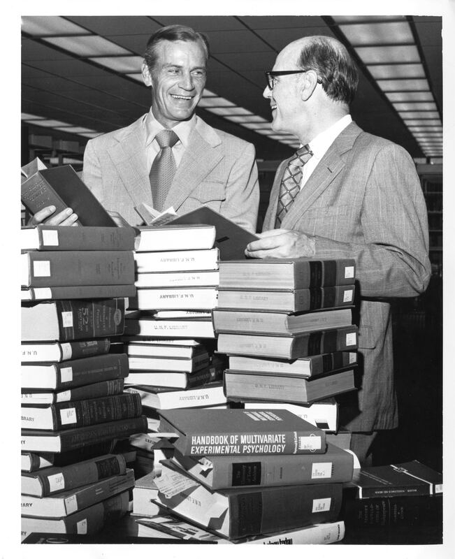President Carpenter reviewing initial library books, with Board of Regents member Robert Mautz in 1972.